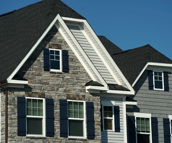 A beautiful residential home demonstrating the visual appeal and resale value of a professional re roofing project.